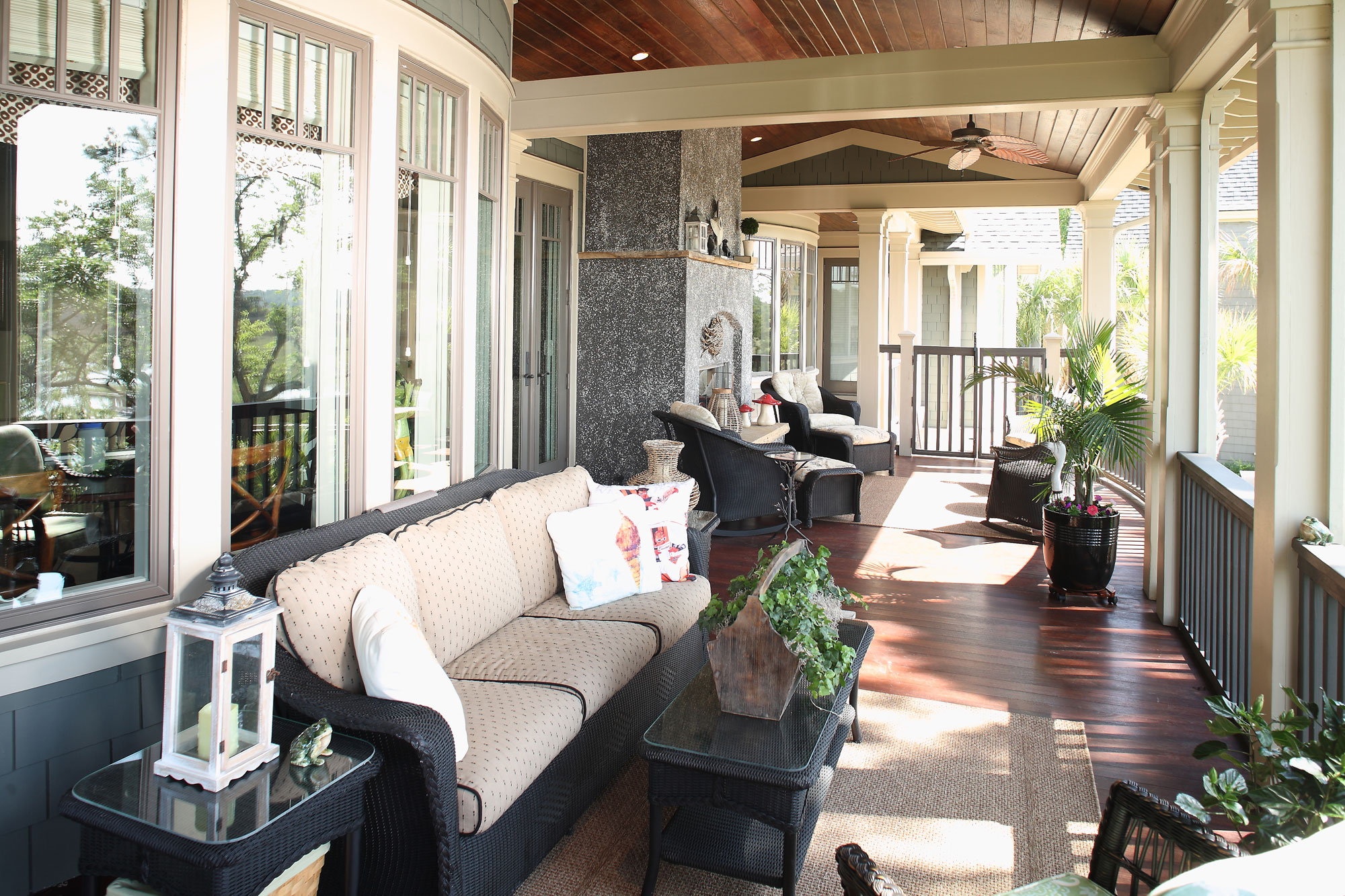 Lowcountry outdoor living on back porch overlooking pool