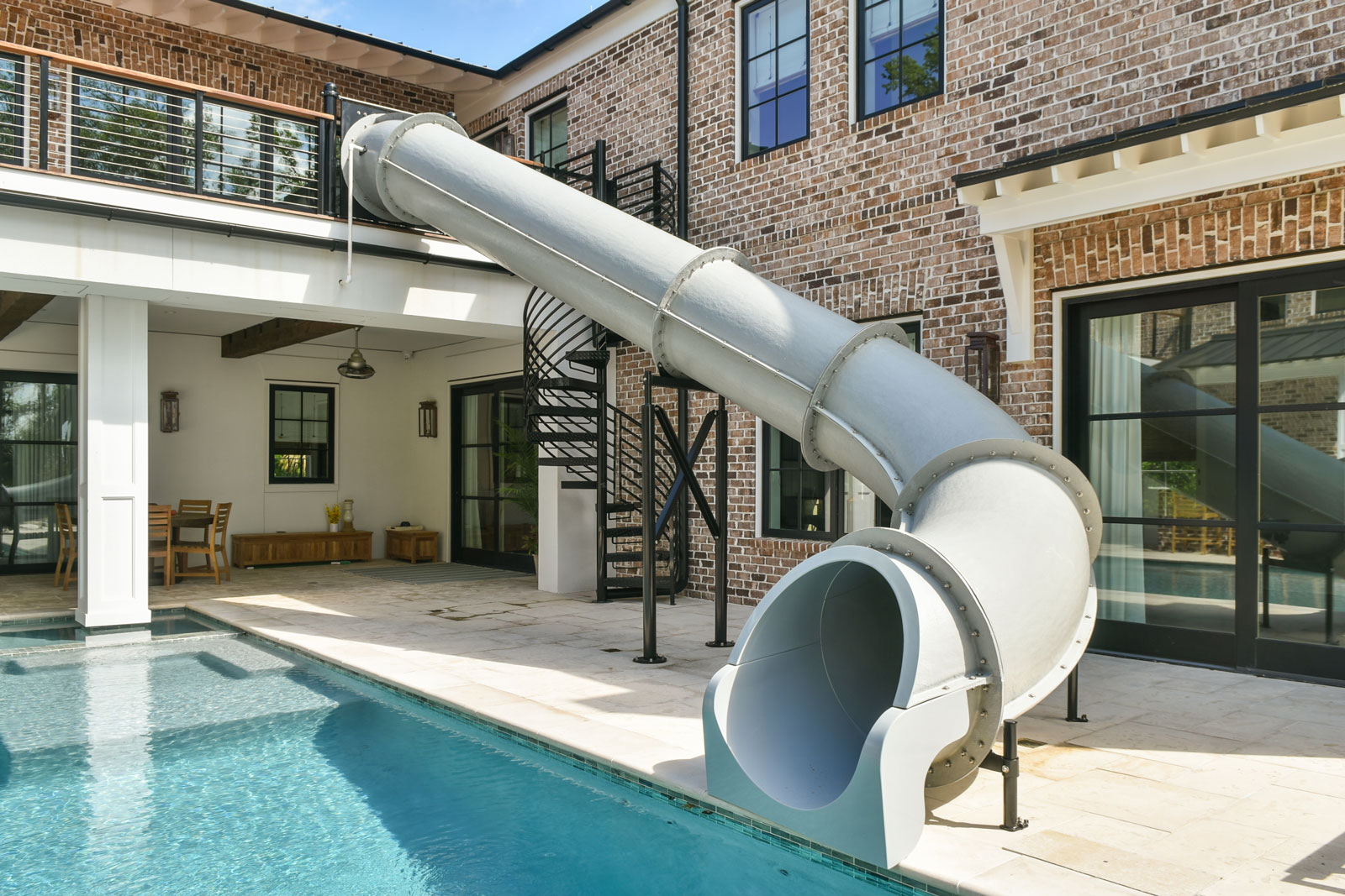 Pool courtyard with two story slide