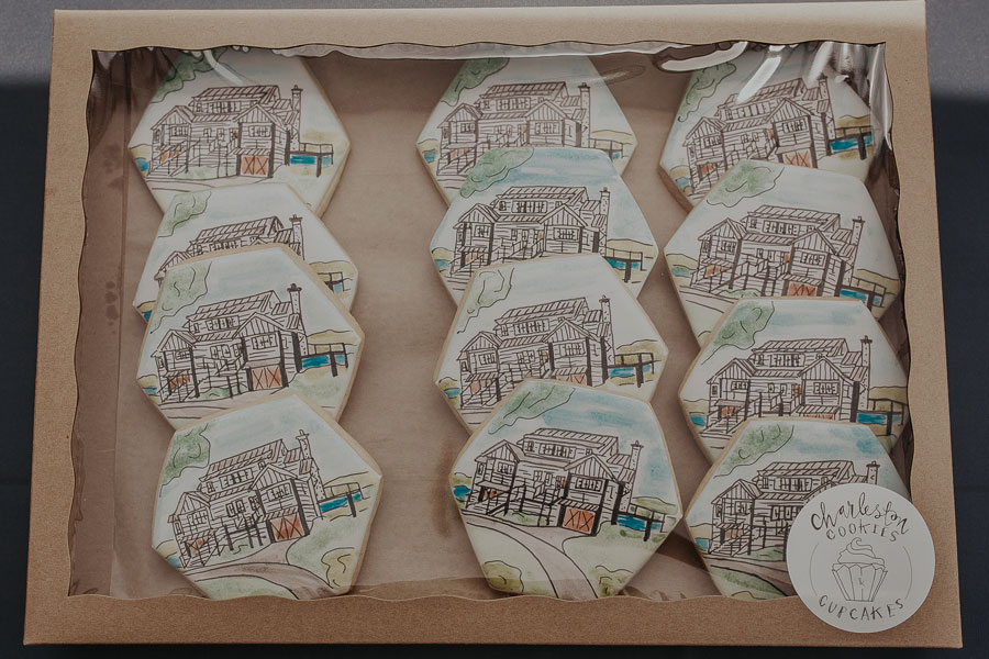 Charleston Cookies & Cupcakes with house design drawn on top of the cookies