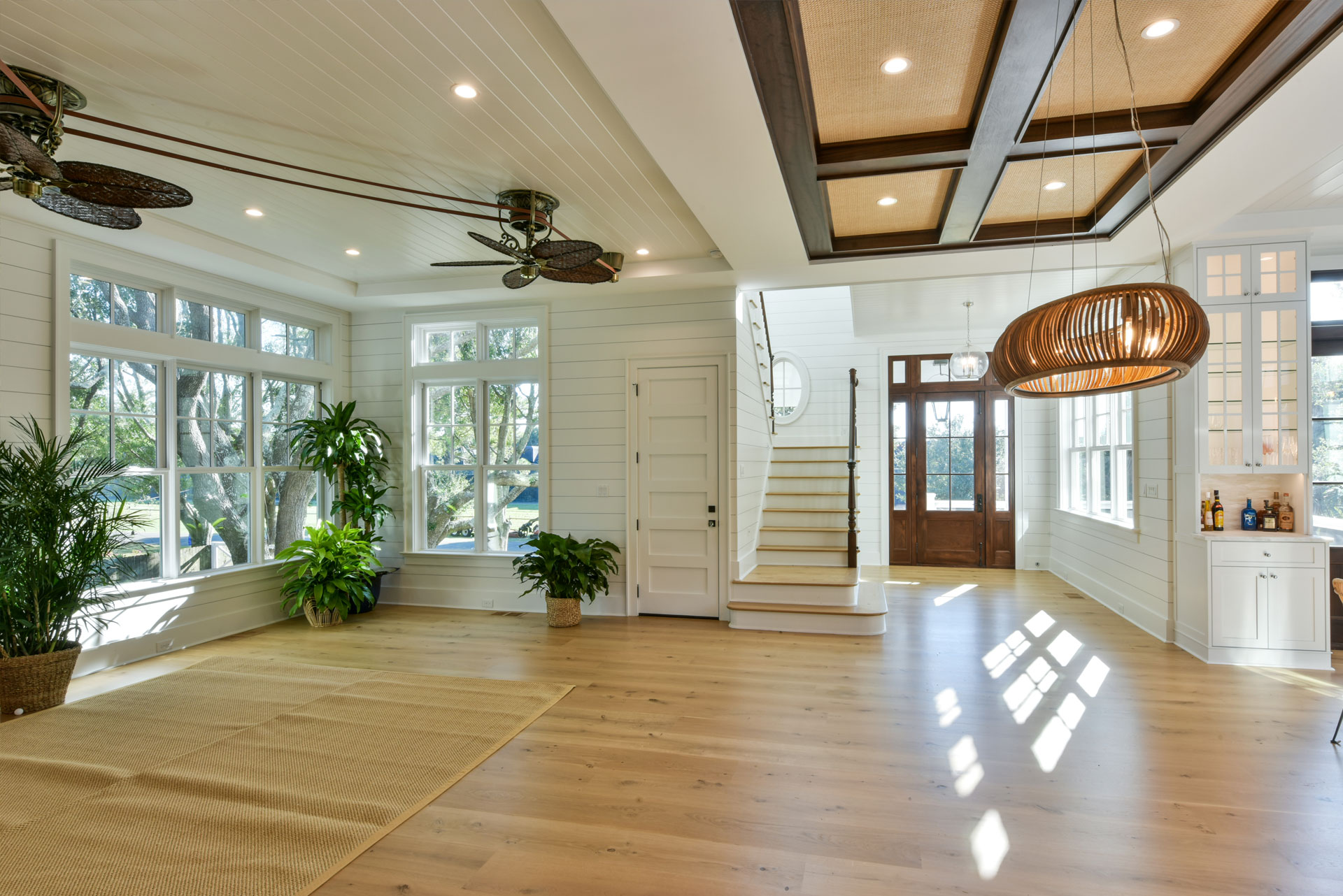 Open main floor entertaining area in large coastal Carolina style home