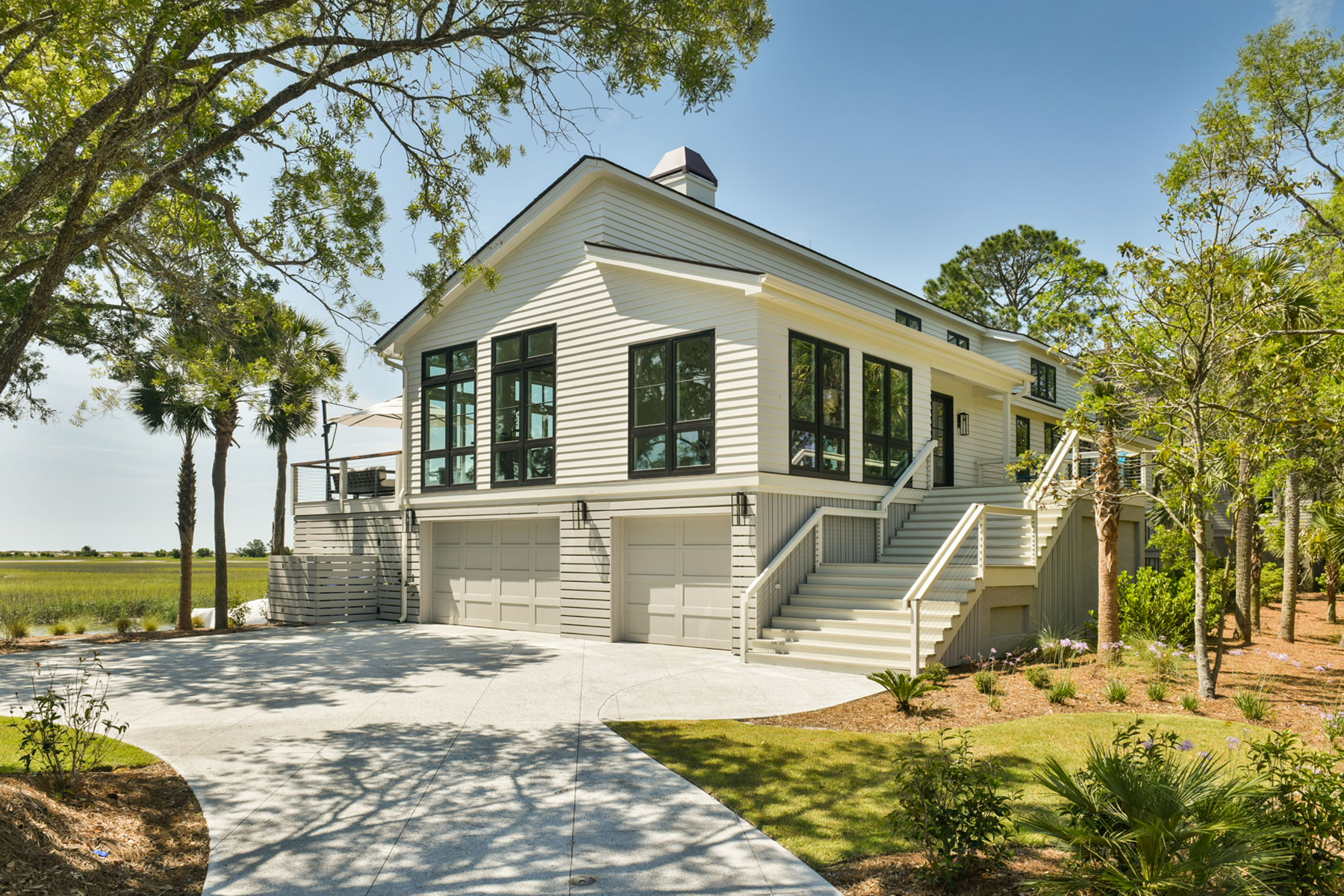 Seabrook Island, South Carolina Renovation of 1990s Marsh Side Home into Modern Beauty by Swallowtail Architecture