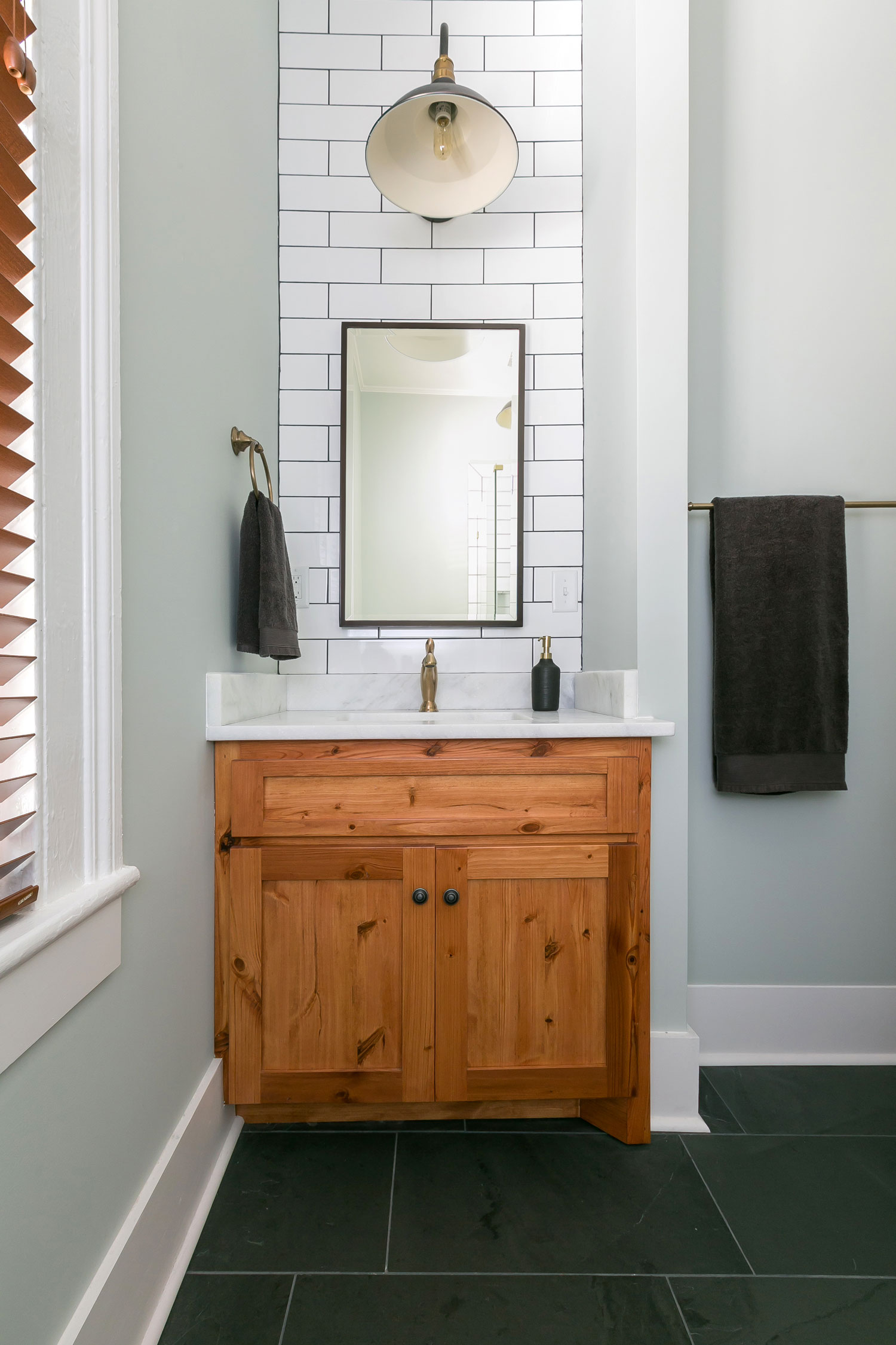 Wood tone vanity in Summerville bathroom renovation