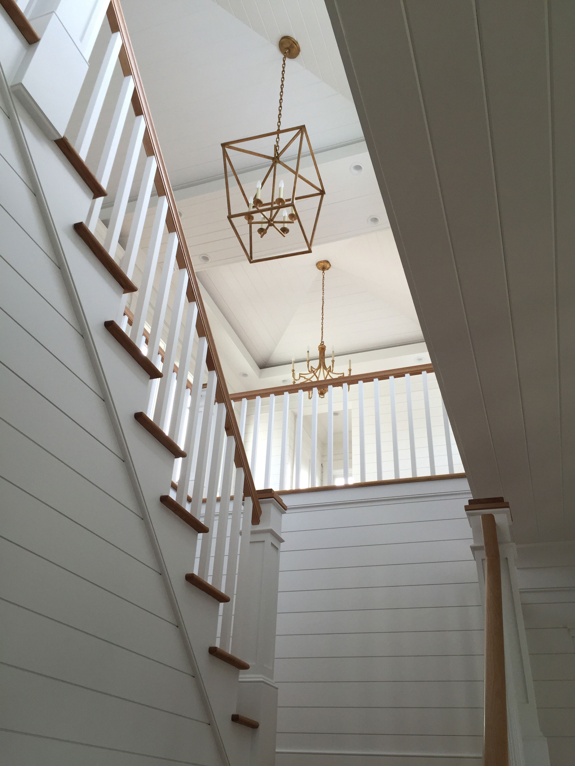 Cathedral ceiling in the stairwell of this new build coastal home