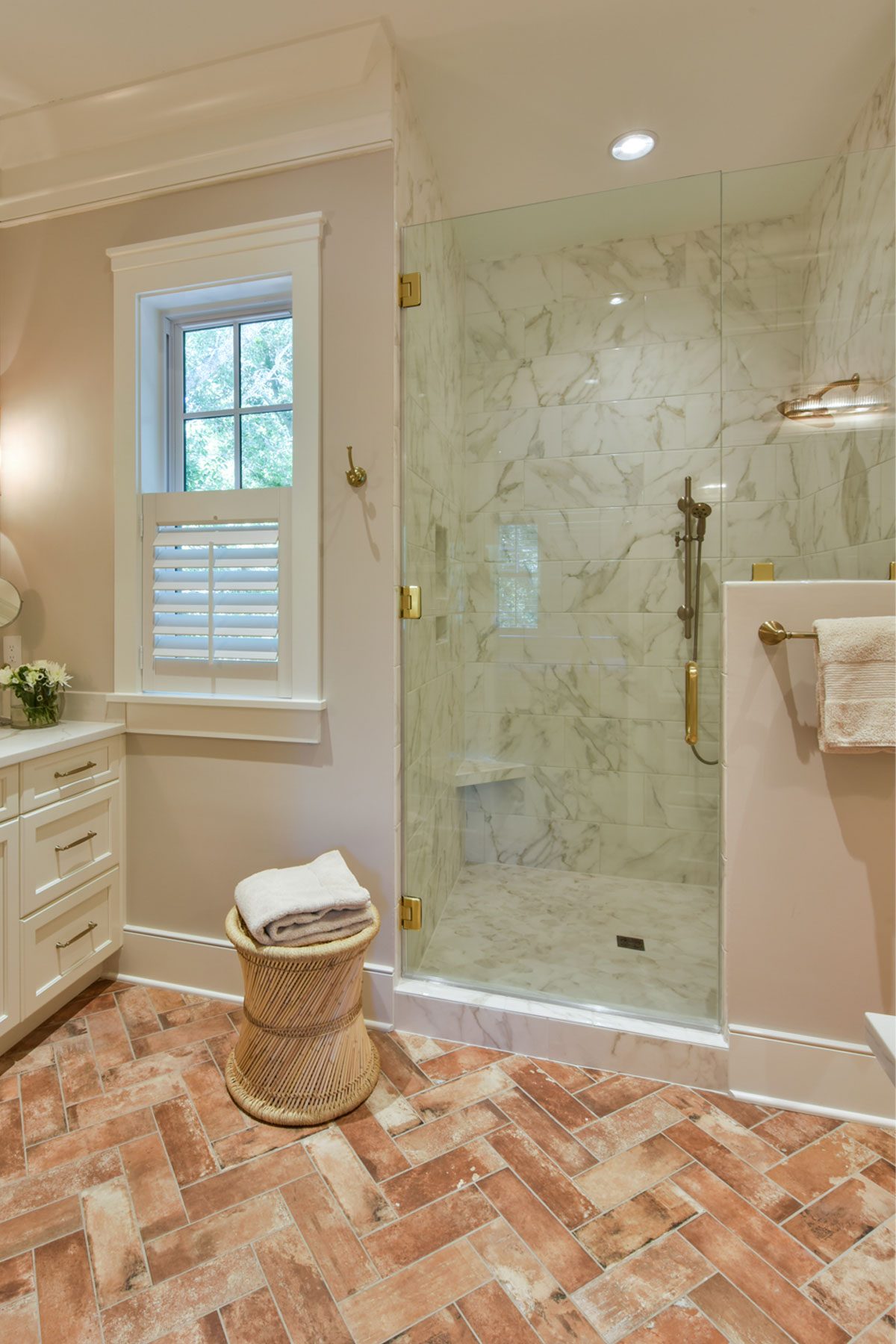 Master bath shower glass enclosure with marble tile