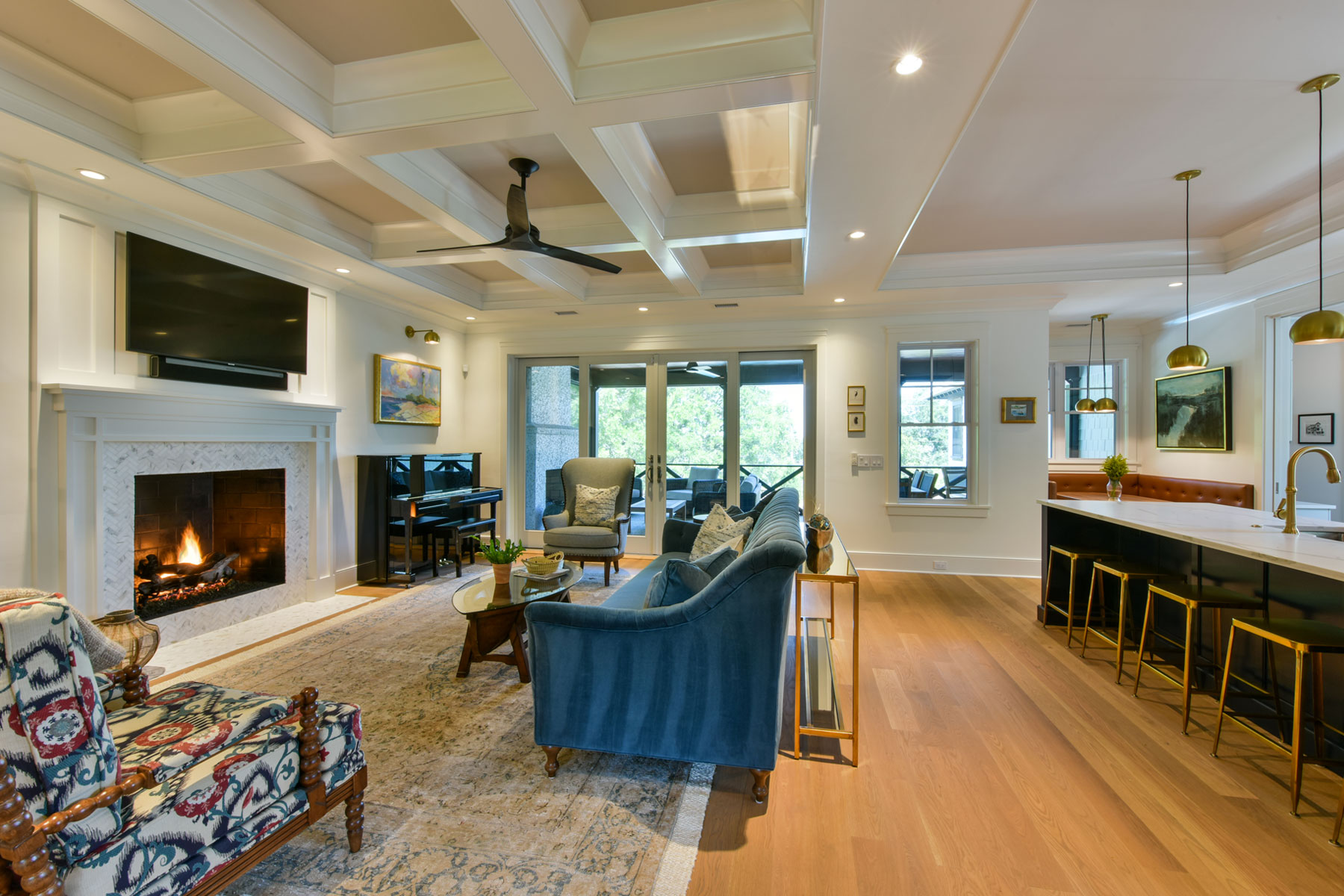 Open kitchen and family room with coffered ceiling