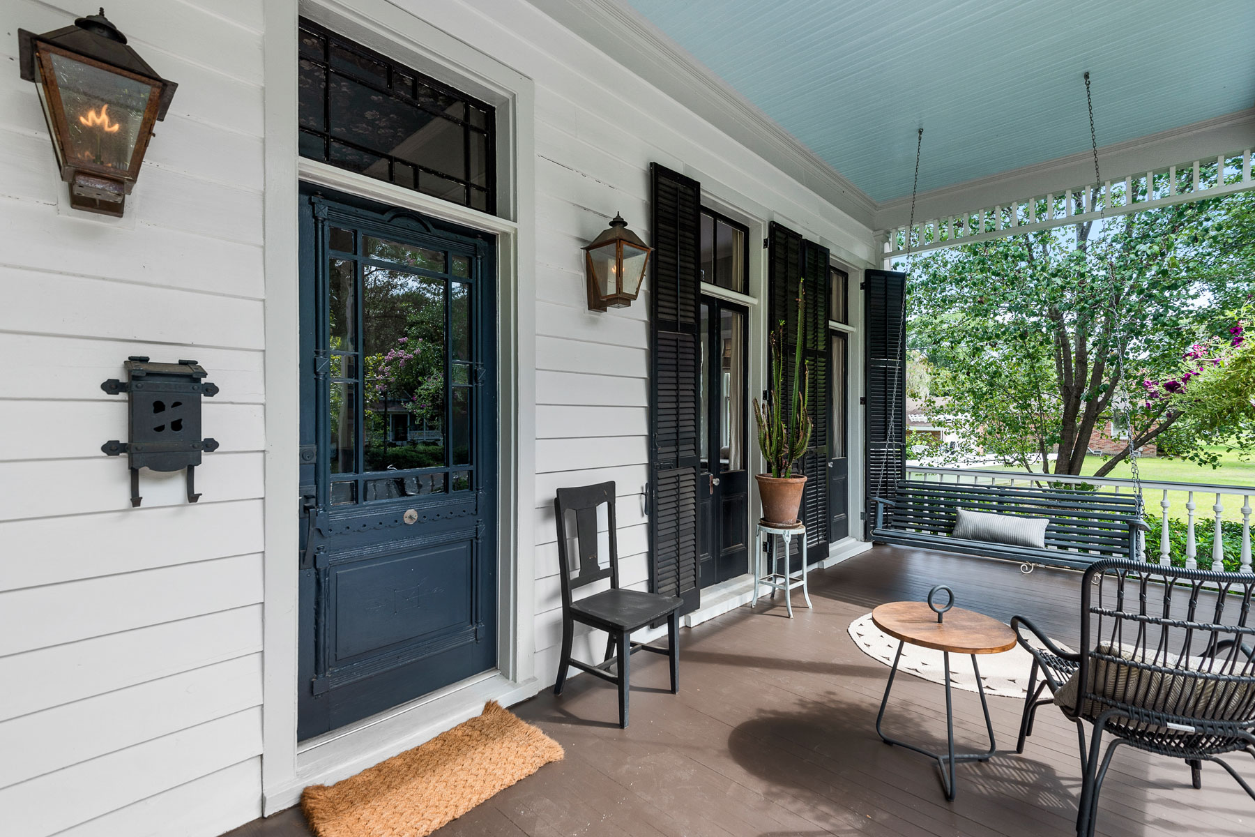 Front porch showing original frech doors opening to porch