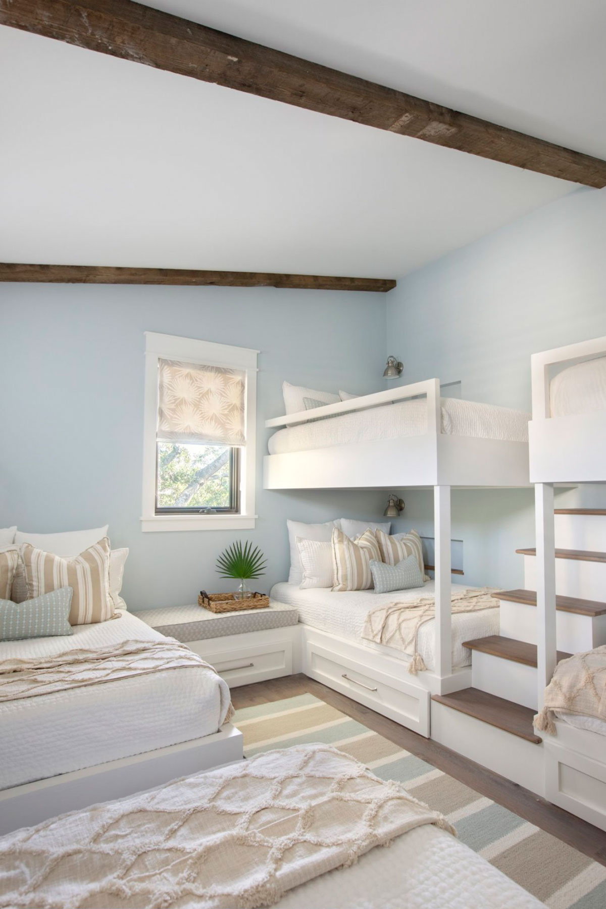 Custom bunk beds in bunk room of new construction home designed by Swallowtail Architecture