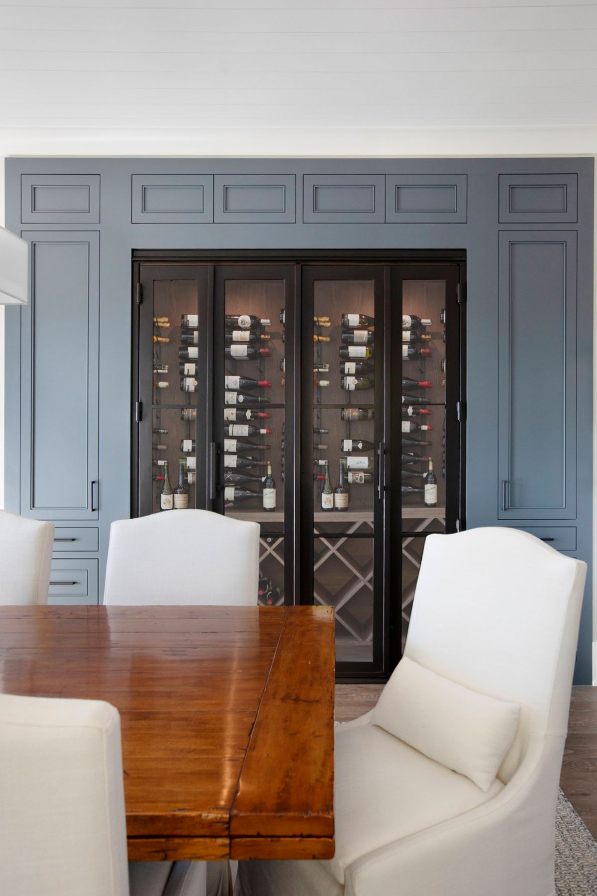 Wine storage display in formal dining room